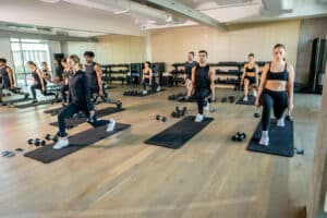 A group of people working out in a gym.
