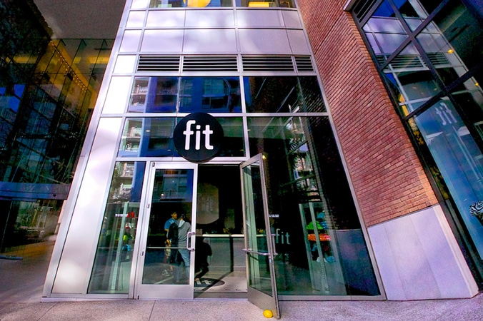The entrance to a building with a glass door.