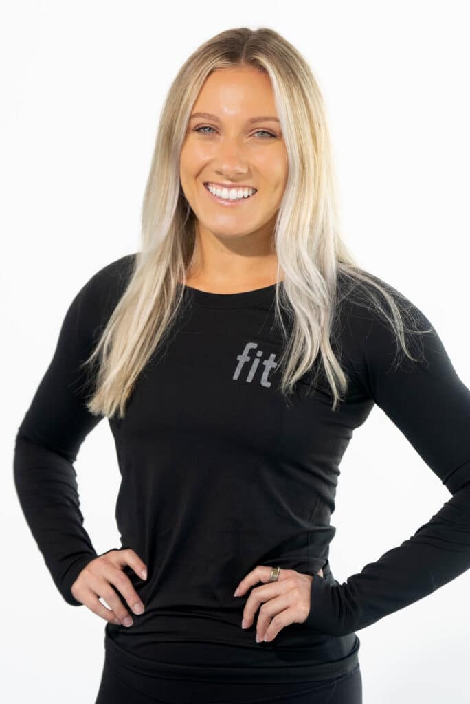 A woman wearing a black long - sleeved shirt.